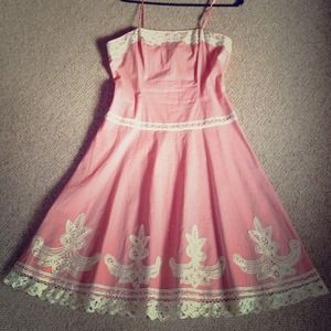 Salmon pink dress.