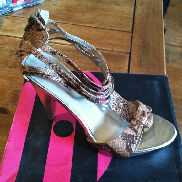 Never worn. Gorgeous heels