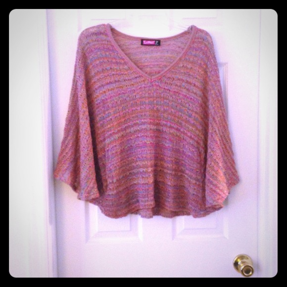 Multi-color cape, v-neck sweater .