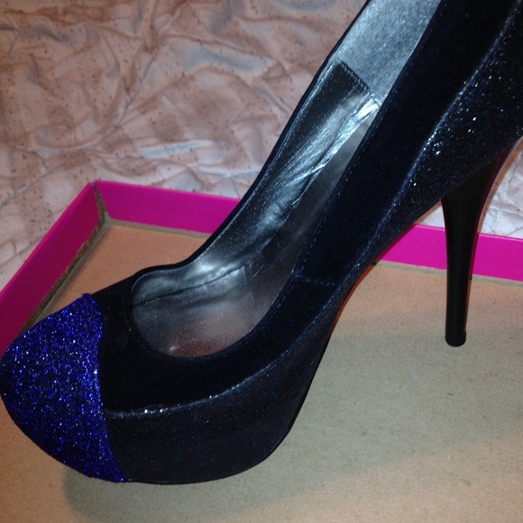Black, Blue, & gray heels. Only wore once.