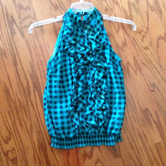 Blue & black checkered top.