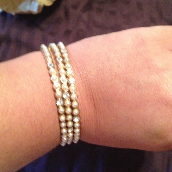 Three bejeweled stackable bracelets