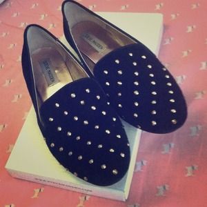 Studded, black sued Steve Madden flats.