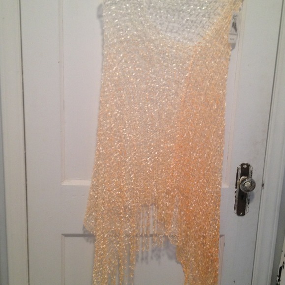 Orange/peach and white shawl.