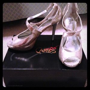 Carlos Santana silver, textured print heels.
