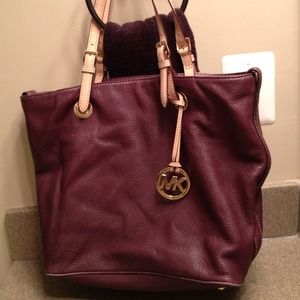 Authentic Michael Kors purplish burgundy handbag