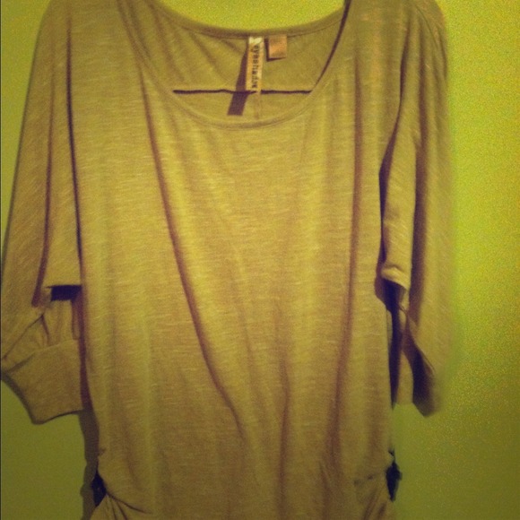 Tan half sleeve shirt and black embellished top