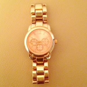 Rose gold watch.