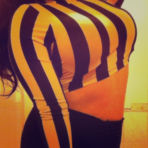 Black and white stripes turtle neck cropped top.
