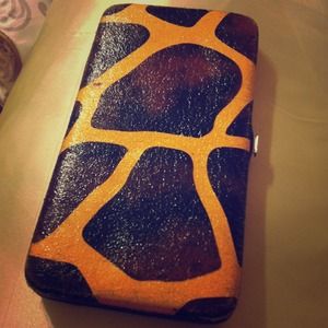 Giraffe print adorable wallet.