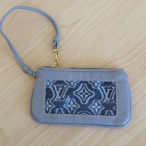 Louis Vuitton wrist bag, make up bag