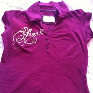 An redish maroon color very cute aero shirt!:)