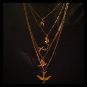 Gold layered bird necklace