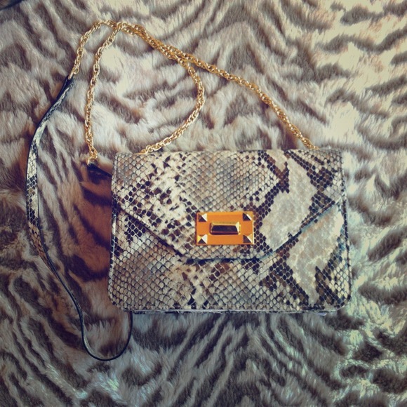 Jessica Simpson Handbags - Jessica Simpson purse or clutch on hold!!!