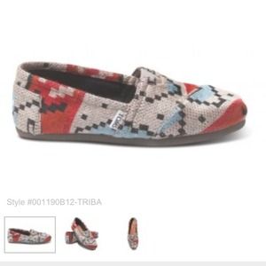 Brand new Toms never worn.