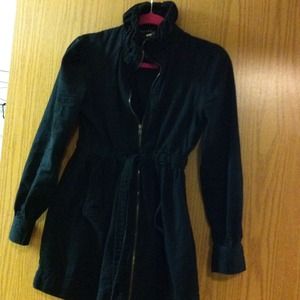 Black zipper and tie jacket.