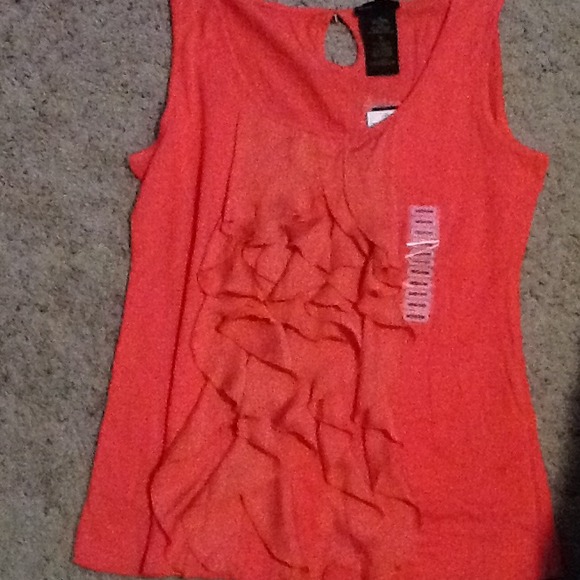 26. Orange ruffle tank