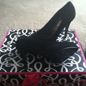 Zebra patterned black heels