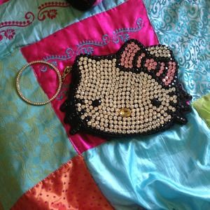 Hello kitty !! Purse so adorable (: