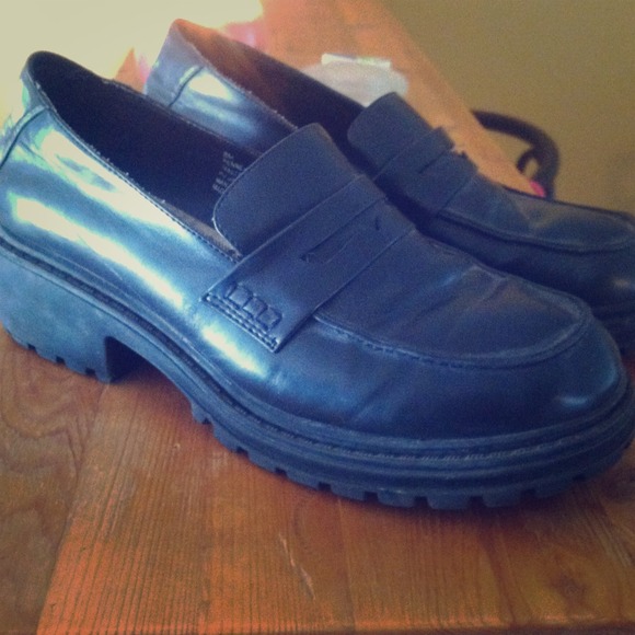 Black penny loafer type shoes