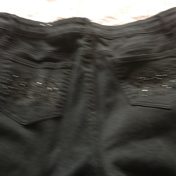 Black jeans with black stones