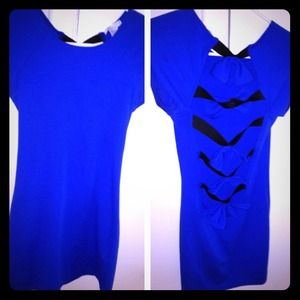 Blue mid length dress with bows in the back