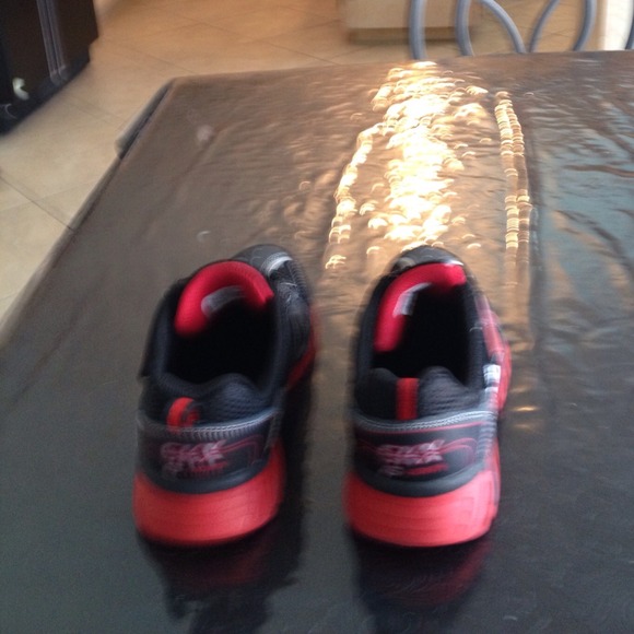 Sketchers light up sneakers, Never Worn.  Size 2