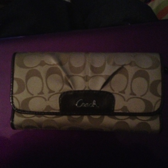 SOLD. Coach wallet with check book cover.