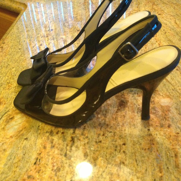 Low heel worn a few times good shape .