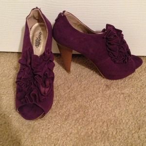 Purple suede booties.