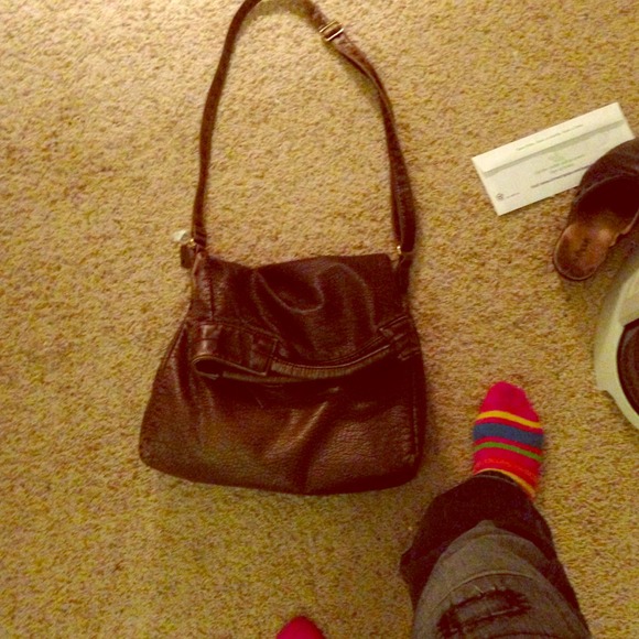 American rag purse you can fit everything in it.