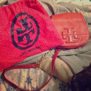 Orange cross-body. Very cute and bright.