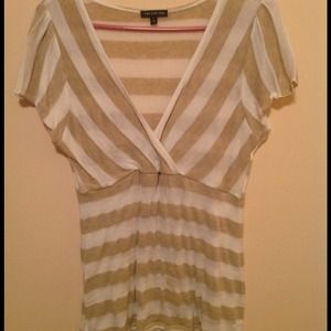 Brown and white striped v neck shirt