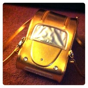 Brand new; Gold, shinny taxi shape purse