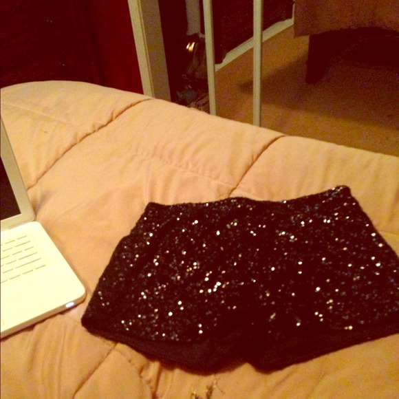 Sparkly black stretchable shorts.