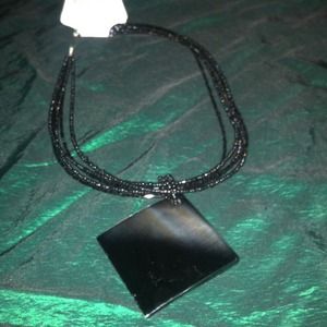 18 in black shell necklace with matching earring