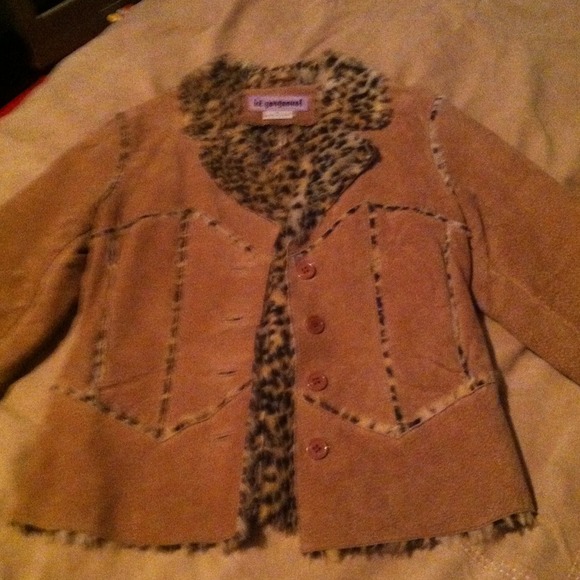 Leather Jacket with fur lining.