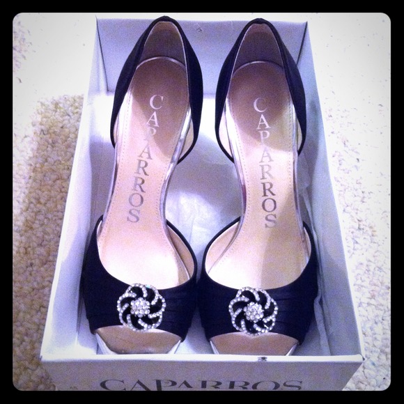 Brand new black satin pumps with box.