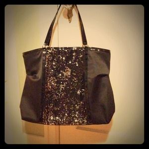 Oversized black satiny and sequin tote