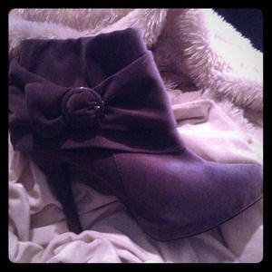 Grayish purple colored booties