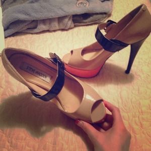 Tan orange and black color block pumps