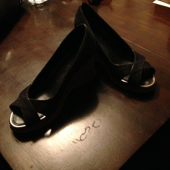 Dark denim wedge peek toed shoes