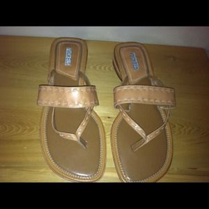 Tan colored flip flop sandals SOLD!!