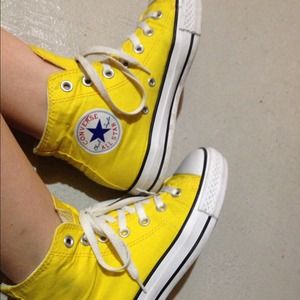 Yellow high top converse