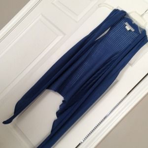 Blue vest. Cute over any T or cami.