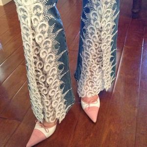 Embellished jeans with flare leg & pleat