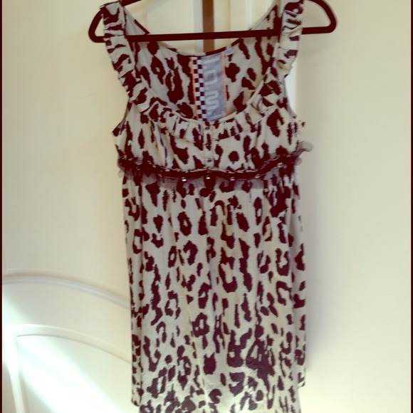 Lamb leopard print dress with beaded accents.
