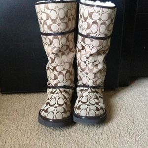 Coach boots size 8.
