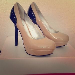 Tan and black platform high heels