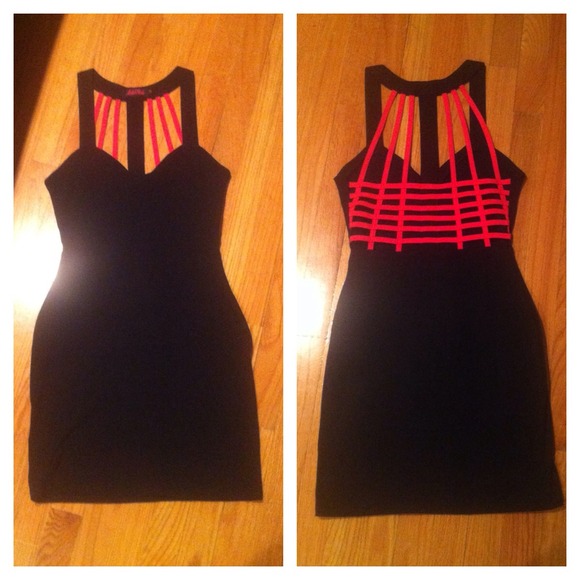 Sold in bundle. NWOT. Sexy dress with cage back.